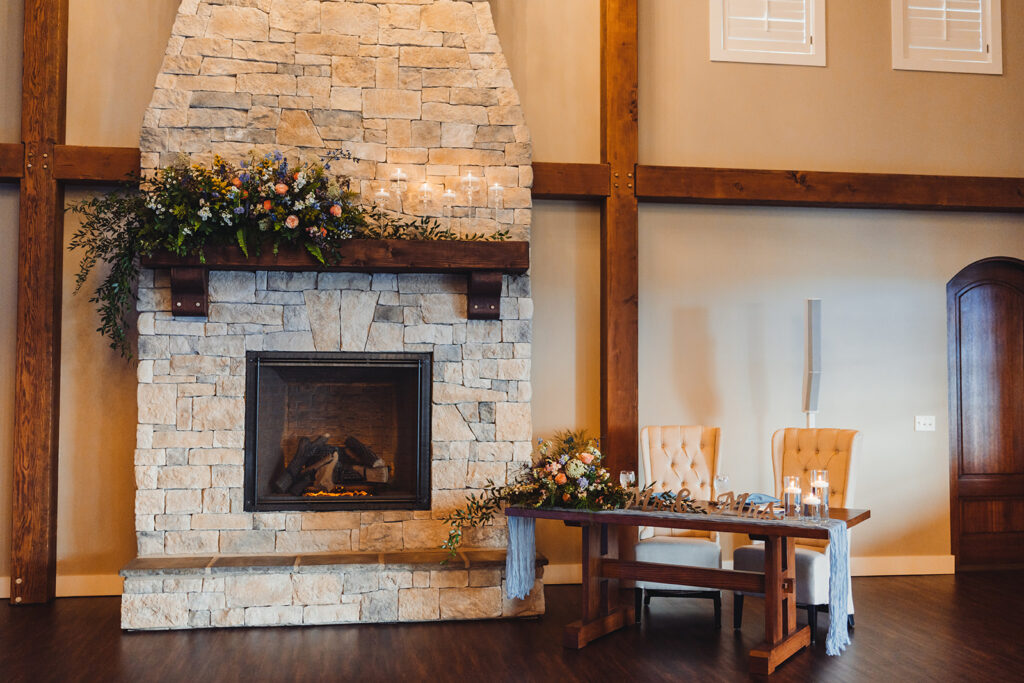 Luxury wedding floral fireplace and sweetheart table